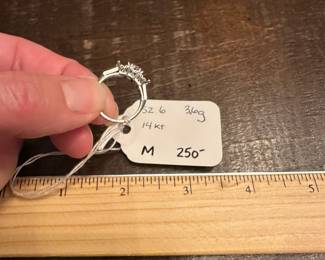 M11 - $250. Size 6. 14kt Engagement Ring. Beautiful setting and center diamond. Both side diamonds have been carefully removed. 