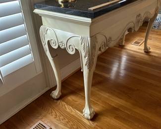 L5 - $250. Marble Top Sofa Table. Off white color painted solid wood - the marble is attached and will be quite heavy to move! Measures 59.5" x 19" x 33" tall. 