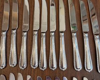 L49 - $275. Hampton Silversmiths Nobility Stainless Flatware. Service for 10 + extras. 73 Pieces total. 