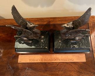 L34 - $30. Set of Vintage Bronze Griffin Bookends. Measures 6.25" x 4" x 9" tall. Faux Marble Base. 