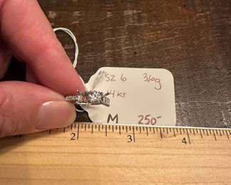 M11 - $250. Size 6. 14kt Engagement Ring. Beautiful setting and center diamond. Both side diamonds have been carefully removed. 