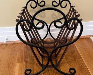 K6 - $25. Wrought Iron and Leather Magazine Holder. Measures 15" x 13" x 16.5" tall. 