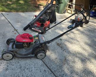 G23 - $350. Honda HRX217 Lawn Mower, started on first pull, no bag.