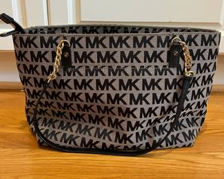 K23 - $30. Michael Kors Canvas Tote. Measures 14.75" x 4.75" x 9" tall. 