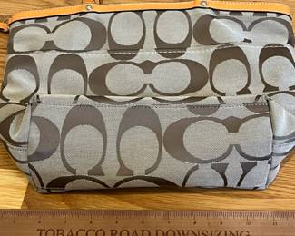 K24 - $25. Vintage Coach Canvas Khaki and Orange Tote with Dust Cover. Measures 14" x 4" x 10"