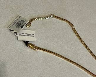K21 - $20. Juicy Couture Angula Spike Pink and Gold Tone Necklace. Measures 19"