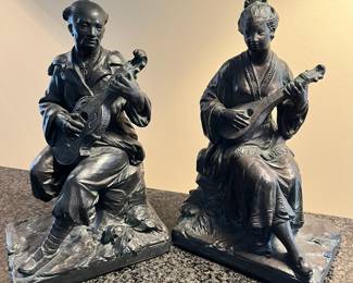 L24 - $60 PAIR. Austin Reproductions Japanese Geisha and Man Playing Shamise Figures/Bookends  - Signed "Lioo" Measures 6.5" x 11" tall. 