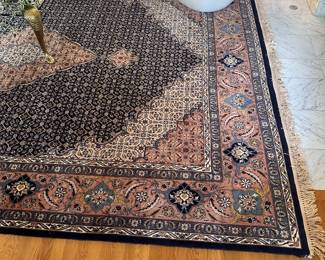 L2 - $1,500 . Large Wool Rug from Pakistan. Hand Woven. Navy / Rose Colors. Measures 109" x 148". There is no tag on the underside that we can find but we do have the original receipt showing it was purchased in 1990. Originally $10,950 -  purchased on sale for $6,000. Excellent Condition - no issues noted.