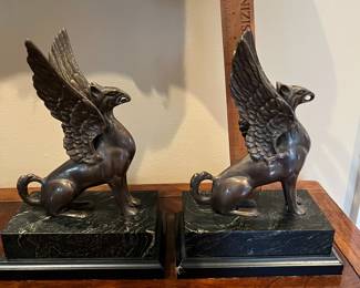 L34 - $30. Set of Vintage Bronze Griffin Bookends. Measures 6.25" x 4" x 9" tall. Faux Marble Base. 