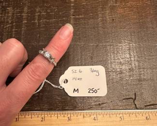 M11 - $250. Size 6. 14kt Engagement Ring. Beautiful setting and center diamond. Both side diamonds have been carefully removed. 