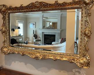 L36 - $85. Gorgeous Faux Gilt, Plastic Framed Mirror. Can be hung vertically or horizontally. Measures 57.5" x 33.75". (This has us all fooled - it does not look plastic!) 