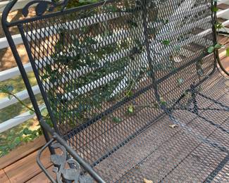 G12 - $125. Wrought Iron Glider Rocker in good condition - there is a bit of minor rust on the bolt areas. Measures 45" wide x 29" deep x 37" tall. Floor to seat is 18"