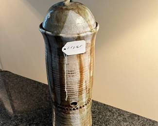 L21 - $40. Unsigned Lidded Pottery. Measures 5.5" x 16.5" tall. 