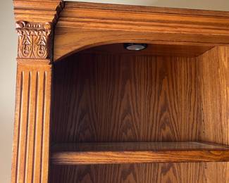 G5 - $150. Lighted Display Case / Bookshelf. Measures 48" x 15" x 84" tall. Center shelf is fixed the 8 other shelves are wood framed with glass inserts. All are adjustable. 