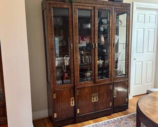 L13 - $250. Drexel Heritage Dynasty Collection China Cabinet in Burled Walnut. Measures 60" x 16" x 79" tall. Moves in ONE piece! Cabinet it lighted and glass shelves are all adjustable. Excellent Condition!