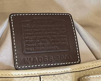 K25 - $70. Y2K Coach Soho Leather Purse. Measures 12" x 2.5" x 8". 