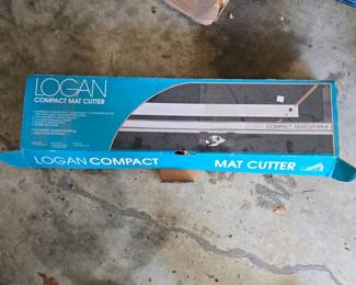 G31 - $40. Logan Compact Mat Cutter Model 301