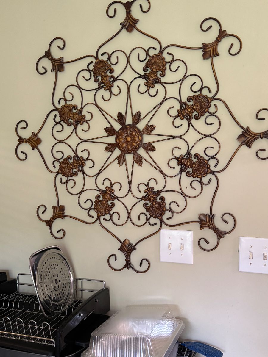 Beautiful gold tone metal wall art