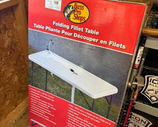 Brand new, still in the box folding fillet table for Bass Pro Shop.