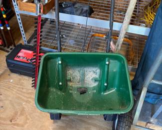 Grass seed spreader.