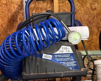 Portable air compressor.