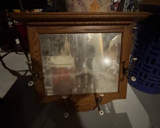 Wall mirror and coat rack