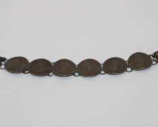 .925 Sterling Coin Style Bracelet signed Mexico .925 sterling and features 6 round medallions done in Mayan style approx 6.75" long nad wieght 25.1 grams total weight