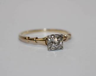 14kt yellow gold Vintage Designer Jabel Diamond Engagement Ring that features a solitare old European cut round diamond that weighs approx .55ct, SI-1, J-K Color set in square white gold peg head mounting yellow gold shank is bamboo style and is signed 1