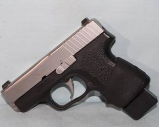 KAHR PM9 9mm Bi-Tone Pistol Extended 7rd. Clip         
extra 8 rd. Clip
Desantis Pocket Holster  **ATF LAWS APPLY**
