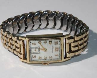 14kt Gold Men's Hamilton 17 Jewel Watch it winds, the second hand is not moving
--