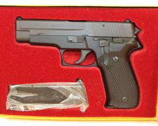 Sig Sauer P226 Automatic Pistol Looks mint unfired in original box with all the paperwork .9mm cal. Ser# U69212 **ATF LAWS APPLY** 