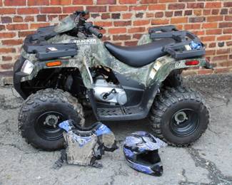 Tracker 90 Kids Four Wheeler in like new condition 