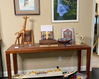 artisan made wood console table , natural top has holes and is gorgeous. Lego Titanic
