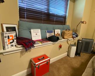 There are many nice coffee table books, nice king size head board pillow, lamps, air purifiers, heaters, fans