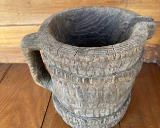 large primitive wooden pitcher