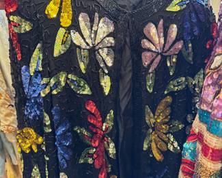 Vintage women's beaded and sequined dresses, tops and jackets