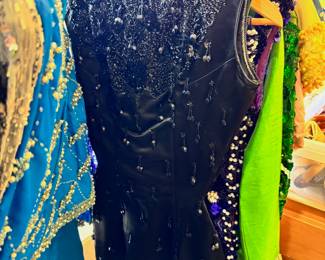 Vintage women's beaded and sequined dresses, tops and jackets