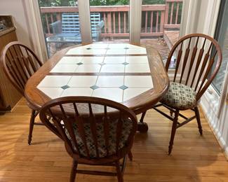 Vtg. tile top kitchen table and 3 chairs