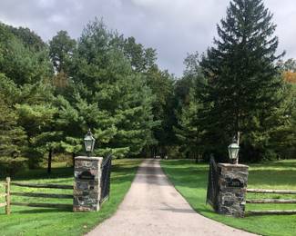 Please park on the street and walk down to the end of the drive.