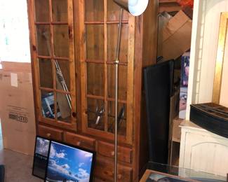 Lighted pine cabinet with glass shelves 