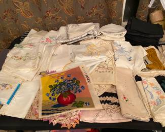 Vintage handmade napkins, dollies, and needlepoint. 