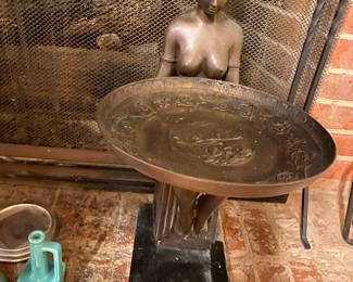  Bronze seated lady with tray.