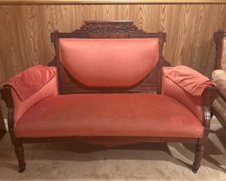 East Lake loveseat.  This piece was passed down in our family from “Aunt Myra” Schlieper of Pittsburgh.  It was originally green velvet in 1880. In 1970’s my mother, Carol, reupholstered it to apricot velvet.  It's awaiting its 2025 makeover unless it's the right color! It’ll be a steal of a deal!