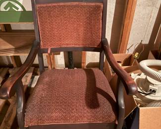 This Mahogany rocker is very sturdy in its’ original fabric.  The wood has a lovely petina.   Give it new life in a nursery.