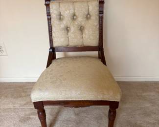 The East Lake chair has a tufted back.