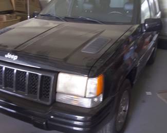 Also behind door number three is this 1998 Jeep grand Cherokee. Has rare V8 engine. Automatic transmission. Leather interior is in great condition. Has new battery, tires in great condition garage kept. 80k + miles