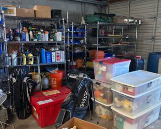 There are many metal shelves of items in this picture- come and see. 