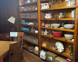 Look at all this lovely stuff! The bottom shelf has 3 boxes of vintage Pfaltzgraff Stoneware. Some pieces have chips, (labeled with tape) but most of the collection is intact. 