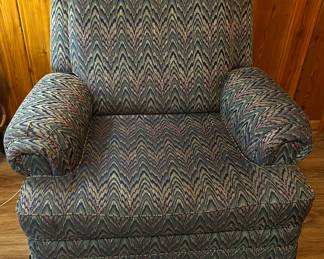 La-Z-Boy manual recliner. It’s a little firmer than the leather furniture. If purple chevron’s not your style, a slipcover can make it match your space. 
