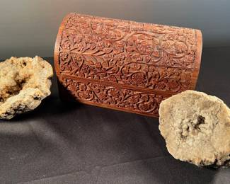 Carved wooden box, two geodes